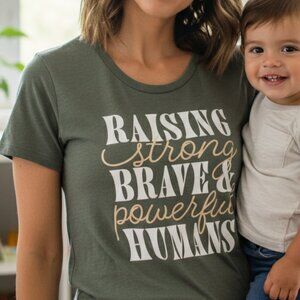 Celebrate It "Raising Strong Humans" Graphic Tee